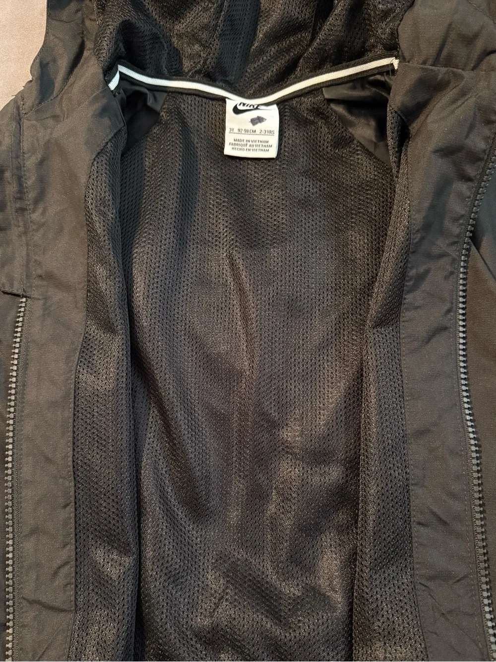 Nike Black Hooded Kids Rain Jacket with White Logo